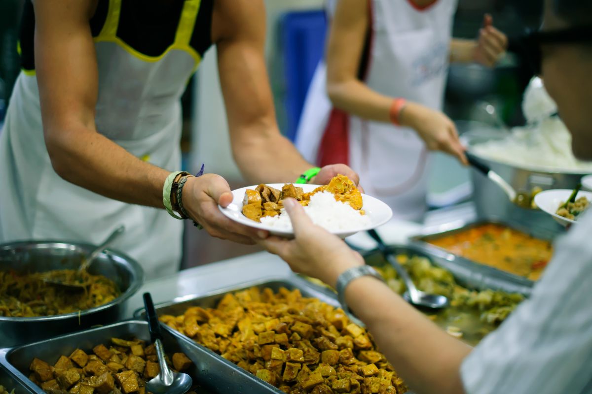 People giving out food.